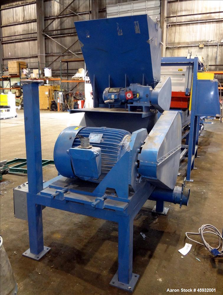 Used Shred Pax Dual Rotor Shredder Grinder System consisting of: (1) Shred Pax Grinder, Model AZ-G-12. Has a top feeder 31-1/2" long x 3-3/4" wide with a 31" long x 8" diameter roll driven by a 1 hp,...