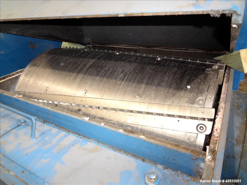 Used Shred Pax Dual Rotor Shredder Grinder System consisting of: (1) Shred Pax Grinder, Model AZ-G-12. Has a top feeder 31-1/2" long x 3-3/4" wide with a 31" long x 8" diameter roll driven by a 1 hp,...