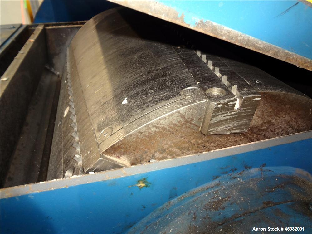Used Shred Pax Dual Rotor Shredder Grinder System consisting of: (1) Shred Pax Grinder, Model AZ-G-12. Has a top feeder 31-1/2" long x 3-3/4" wide with a 31" long x 8" diameter roll driven by a 1 hp,...