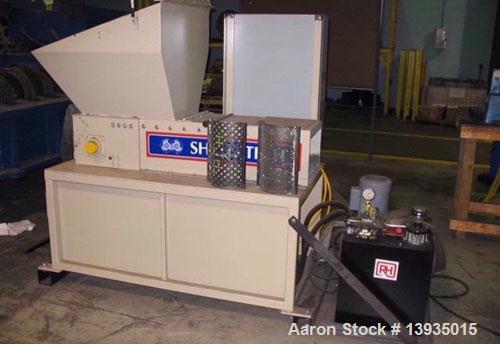 Used Shred-Tech Model STS-7 Single Shaft Shredder. 12.5" x 24" hopper opening, ram feed, 10 hp, approximately 10 hours of use.