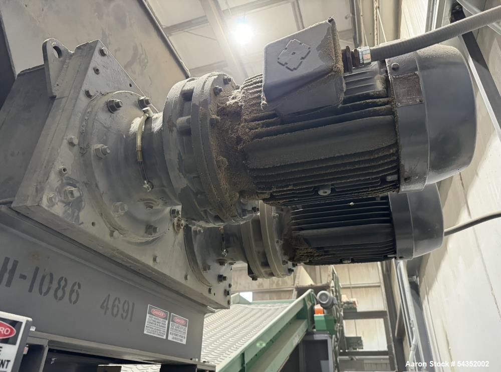 Used Shred-Tech Dual Shaft Shredder. With dual 30hp motor, feed hopper, stand, panel.