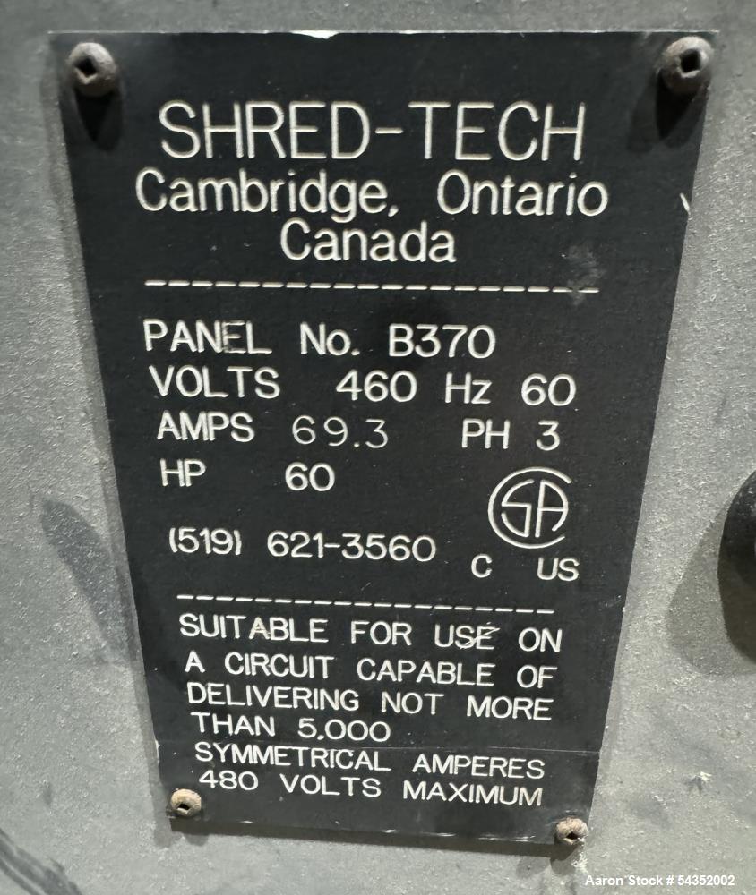 Used Shred-Tech Dual Shaft Shredder. With dual 30hp motor, feed hopper, stand, panel.