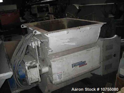 Used Vecoplan Model RG42/30WP Shredder. 30 Hp, 460 volt drive motor into gearbox, belt drive, 10" diameter 42" wide rotor with 27 indexable cutters at 120 rpm, 1.4 kW hydraulic ram motor, 2.9 cubic y...