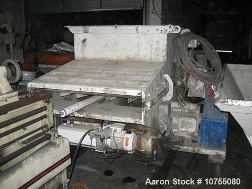 Used Vecoplan Model RG42/30WP Shredder. 30 Hp, 460 volt drive motor into gearbox, belt drive, 10" diameter 42" wide rotor with 27 indexable cutters at 120 rpm, 1.4 kW hydraulic ram motor, 2.9 cubic y...
