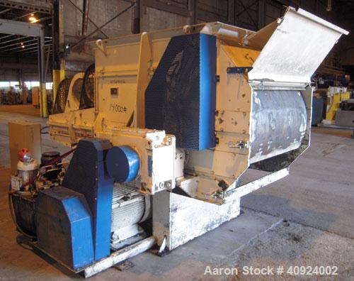 Used Vecoplan/ ReTech Single-Shaft Rotary Grinder, Model RG52/75, carbon steel. Approximately 15" diameter x 51" wide rotor with bolt-on cutting inserts, approximate (.10) to (.030) cutting tolerance...