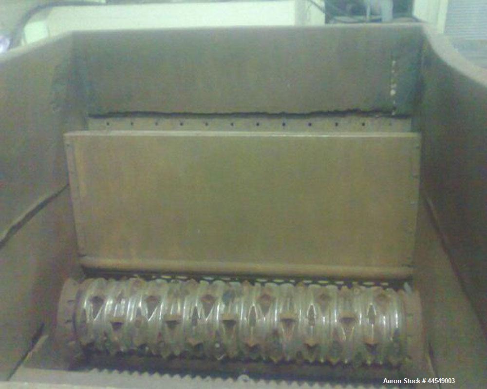 Used Vecoplan VAZ 300-250 Single Shaft Shredder.  Feed opening 118" x 98" (3000 x 2500 mm).  Maximum throughput 4400 lbs (2000 kilos/hour).  Motor 268 hp (200 kw).  50 Hz.