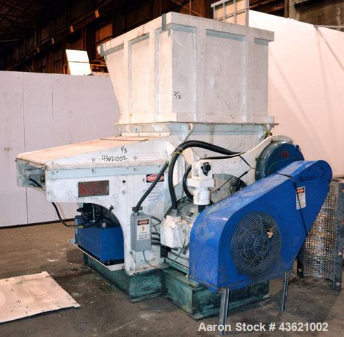 Used Vecoplan/Re-Tech Single Shaft Shredder, Carbon Steel. Approximately 14” diameter x 42” wide rotor with bolt-on cutters. Approximate 44” x 49” feed opening with bolt on hopper. Dual ram horizonta...