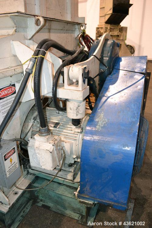Used Vecoplan/Re-Tech Single Shaft Shredder, Carbon Steel. Approximately 14” diameter x 42” wide rotor with bolt-on cutters. Approximate 44” x 49” feed opening with bolt on hopper. Dual ram horizonta...