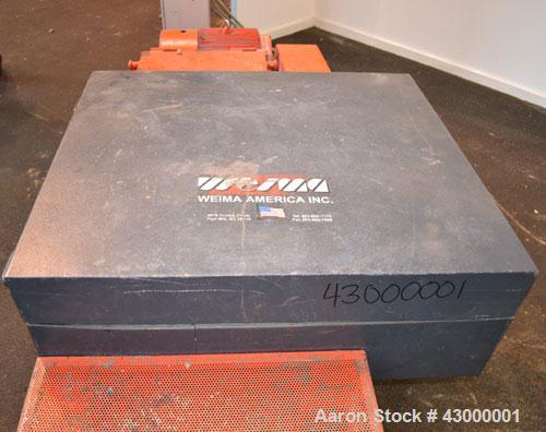 Used Weima Slow Speed Shredder, Model WLH600S/45 Leopard, Carbon Steel. Approximately 368mm (14.4" diameter) x 24" wide (32) bolt on blade  V rotor, driven by a 45 kw (60 hp), 3/60/460 volt, 1770 rpm...