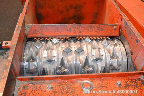 Used Weima Slow Speed Shredder, Model WLH600S/45 Leopard, Carbon Steel. Approximately 368mm (14.4" diameter) x 24" wide (32) bolt on blade  V rotor, driven by a 45 kw (60 hp), 3/60/460 volt, 1770 rpm...