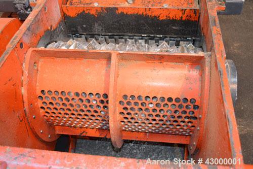 Used Weima Slow Speed Shredder, Model WLH600S/45 Leopard, Carbon Steel. Approximately 368mm (14.4" diameter) x 24" wide (32) bolt on blade  V rotor, driven by a 45 kw (60 hp), 3/60/460 volt, 1770 rpm...