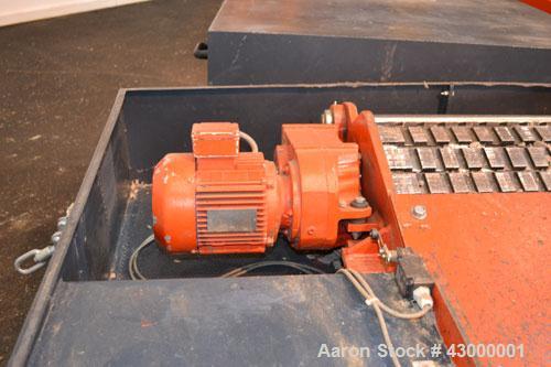 Used Weima Slow Speed Shredder, Model WLH600S/45 Leopard, Carbon Steel. Approximately 368mm (14.4" diameter) x 24" wide (32) bolt on blade  V rotor, driven by a 45 kw (60 hp), 3/60/460 volt, 1770 rpm...
