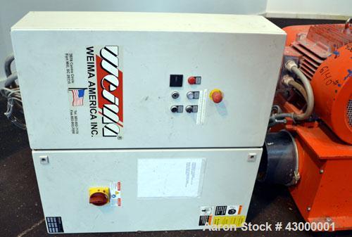 Used Weima Slow Speed Shredder, Model WLH600S/45 Leopard, Carbon Steel. Approximately 368mm (14.4" diameter) x 24" wide (32) bolt on blade  V rotor, driven by a 45 kw (60 hp), 3/60/460 volt, 1770 rpm...