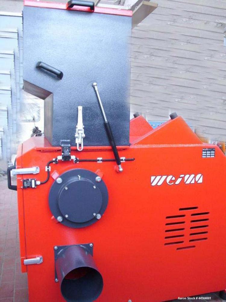 Used Weima NZ 6S Single Shaft Shredder.  Feed opening 11.8" x 31.4" (300 x 800 mm).  (10) Rotor blades.  (2) Stator knives.  Rotor diameter 11.8" (300 mm).  Motor 40 hp (30 kW), 50 Hz.