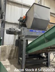 Used Shred-Tech Dual Shaft Shredder. With dual 30hp motor, feed hopper, stand, panel.