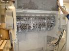 Used EconoGrind single shaft shredder, model ESS 1200. Feed throat opening 55.9