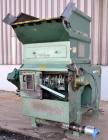 Used Uni-Shred Single Shaft Shredder, Carbon Steel. Approximately 14” diameter x 44” wide rotor with bolt-on cutters. Approximately 40-1/2” x 44-1/2” feed opening with hopper. Single ram horizontal h...