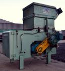 Used Uni-Shred Single Shaft Shredder, Carbon Steel. Approximately 14” diameter x 44” wide rotor with bolt-on cutters. Approximately 40-1/2” x 44-1/2” feed opening with hopper. Single ram horizontal h...