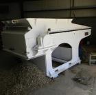 Used Retech Shredder/Grinder, Model 52/100. 40 mm rotating cutters with 4 points. Changeable counter knife. 100 hp motor with new fluid drive coupling and a rebuilt link belt gear box. Control panel....