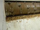 Used Retech Shredder/Grinder, Model 52/100. 40 mm rotating cutters with 4 points. Changeable counter knife. 100 hp motor with new fluid drive coupling and a rebuilt link belt gear box. Control panel....