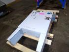 Used SSI Dual-Shear Shredder, Model M55E.