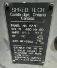 Used Shred-Tech Dual Shaft Shredder. With dual 30hp motor, feed hopper, stand, panel.