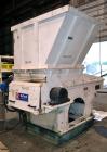 Used Vecoplan/Re-Tech Single Shaft Shredder, Carbon Steel. Approximately 14” diameter x 42” wide rotor with bolt-on cutters. Approximate 44” x 49” feed opening with bolt on hopper. Dual ram horizonta...
