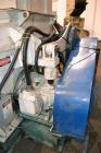 Used Vecoplan/Re-Tech Single Shaft Shredder, Carbon Steel. Approximately 14” diameter x 42” wide rotor with bolt-on cutters. Approximate 44” x 49” feed opening with bolt on hopper. Dual ram horizonta...