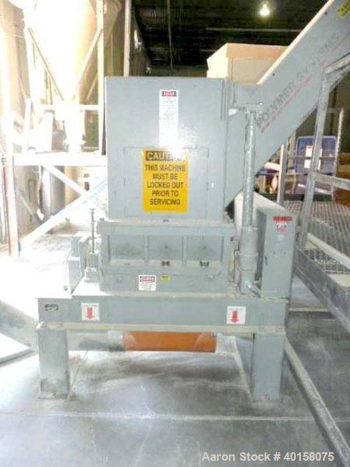 Used Polymer Systems 16" X 26" Scrap Grinder, model 1626. 3 knife open rotor with scissors cut. Includes 100 hp motor, standard tray feed hopper with auxiliary pipe feed chute, spare blades and blowe...