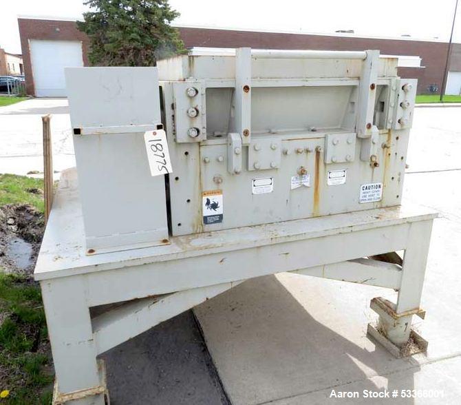 Used Cumberland Model 1837B granulator. 18" x 37" feed throat. 3 knife high shear rotor with two bed knives. Belt driven rotor by a 100 HP,  3/60/230/460 volt, 1775 RPM motor. Tray in-feed hopper. 84...