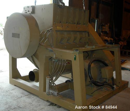 USED: Granulator. 48" x 28" feed opening with bolt-on hopper, approx 48" wide 3 rows of 2 bolt-on slanted blades, open rotor, bottom blower discharge. Approximate 3/4" screen holes. Driven by a 125 h...