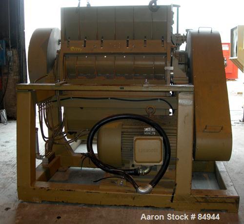 USED: Granulator. 48" x 28" feed opening with bolt-on hopper, approx 48" wide 3 rows of 2 bolt-on slanted blades, open rotor, bottom blower discharge. Approximate 3/4" screen holes. Driven by a 125 h...