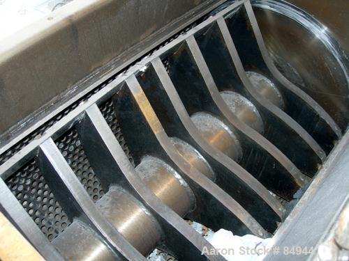 USED: Granulator. 48" x 28" feed opening with bolt-on hopper, approx 48" wide 3 rows of 2 bolt-on slanted blades, open rotor, bottom blower discharge. Approximate 3/4" screen holes. Driven by a 125 h...