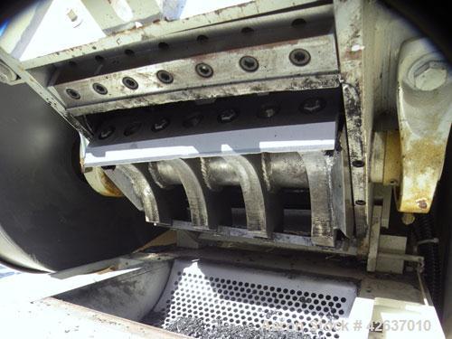 Used Ball & Jewel Vision Series Granulator, Model BP32. Approximately 12" diameter x 12" wide 3 bolt-on blade open rotor. Tilt back pelican style feed hopper with a sheet feeder, driven by a 3/4hp, 9...