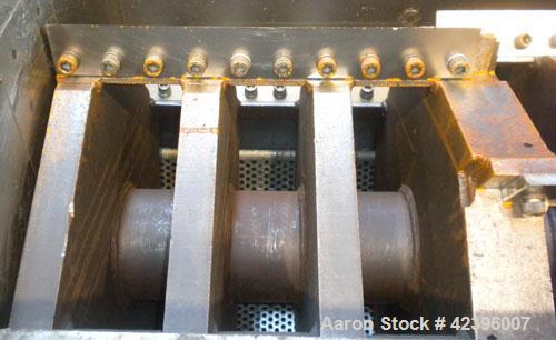Used Ball & Jewell Granulator, Model HDB-3652. Approximate 52 1/4" long x 39 1/2" wide feed opening. Open rotor with bolt on blades. Driven by (2) 100 HP, 3/60/460 volt, 1185 RPM motors with Stearns ...