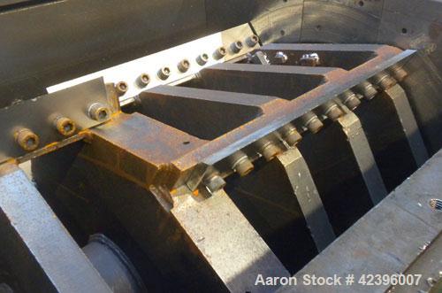 Used Ball & Jewell Granulator, Model HDB-3652. Approximate 52 1/4" long x 39 1/2" wide feed opening. Open rotor with bolt on blades. Driven by (2) 100 HP, 3/60/460 volt, 1185 RPM motors with Stearns ...