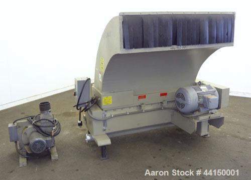 Used Ball & Jewell Sheet Granulator. Approximately 10" diameter x 50" wide 4 bolt-on blade closed rotor. Tilt back pelican style feed hopper. Set up for blower discharge with a  3hp, 3/60/208-230/460...