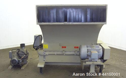 Used Ball & Jewell Sheet Granulator. Approximately 10" diameter x 50" wide 4 bolt-on blade closed rotor. Tilt back pelican style feed hopper. Set up for blower discharge with a  3hp, 3/60/208-230/460...