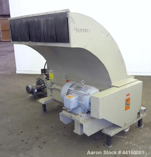 Used Ball & Jewell Sheet Granulator. Approximately 10" diameter x 50" wide 4 bolt-on blade closed rotor. Tilt back pelican style feed hopper. Set up for blower discharge with a  3hp, 3/60/208-230/460...
