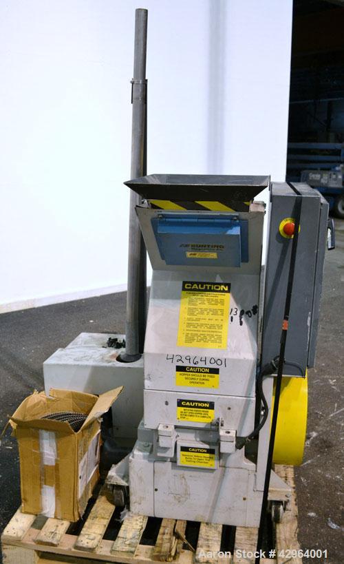 Used Battenfeld Gloucester Granulator, Model 1012BP7.5. Approximate 10" diameter x 12" wide 3 bolt on blade open rotor. Tilt back pelican feed hopper with magnet. Driven by a 7-1/2 hp, 3/60/208-230/4...