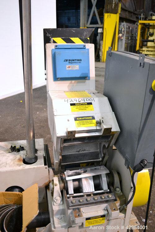 Used Battenfeld Gloucester Granulator, Model 1012BP7.5. Approximate 10" diameter x 12" wide 3 bolt on blade open rotor. Tilt back pelican feed hopper with magnet. Driven by a 7-1/2 hp, 3/60/208-230/4...