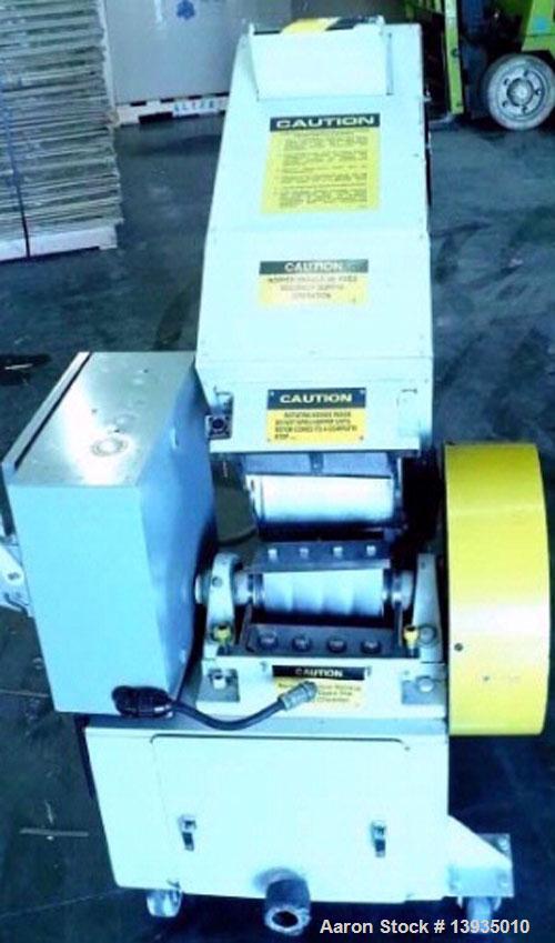Used 2000 Battenfeld Gloucester Model 68-BP-5. Throat opening size 8" x 6", 2 rotor knives, 1 bed knife, 5 hp, rides on casters.