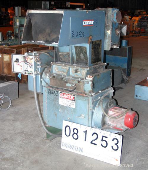 USED: Conair Hushgard granulator, model G1420. 3 bolt-on blade openrotor. Pelican feed hopper with 2 metal pull rolls for back sheetfeed, driven by a 3/4 hp DC motor. Unit set up for bottom blowerdis...