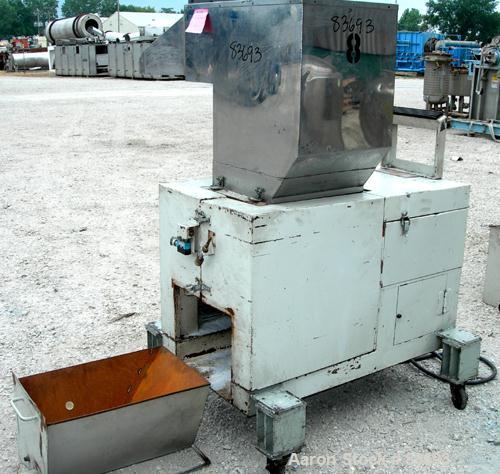 USED: Conair/Wor-Tex granulator, model JC10. 10" diameter x 15" wide involute parabolic segmented helical type rotor with 3 rows of 6 blades, 2 bed knives. Pelican type feed. Driven by a 10 hp, 3/60/...
