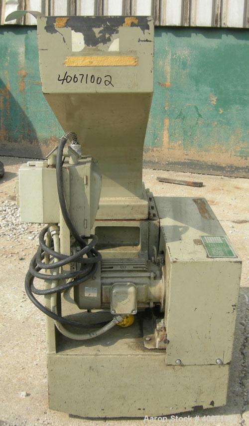 Used Conair/Wortex Granulator, model LP-330. Approximate 6" diameter x 7" long segmented helical type rotor with 3 rows of 5 blades. 7 3/4" x 7 1/4" carbon steel chamber. 12" x 12" top feed opening. ...