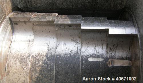 Used Conair/Wortex Granulator, model LP-330. Approximate 6" diameter x 7" long segmented helical type rotor with 3 rows of 5 blades. 7 3/4" x 7 1/4" carbon steel chamber. 12" x 12" top feed opening. ...