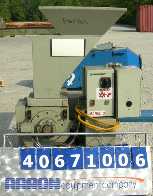 Used Conair/Wortex Granulator, model LP-330. Approximate 6" diameter x 7" long segmented helical type rotor with 3 rows of 5 blades. 7 3/4" x 7 1/4" carbon steel chamber. 24" x 24" top feed opening. ...