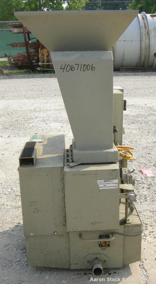 Used Conair/Wortex Granulator, model LP-330. Approximate 6" diameter x 7" long segmented helical type rotor with 3 rows of 5 blades. 7 3/4" x 7 1/4" carbon steel chamber. 24" x 24" top feed opening. ...