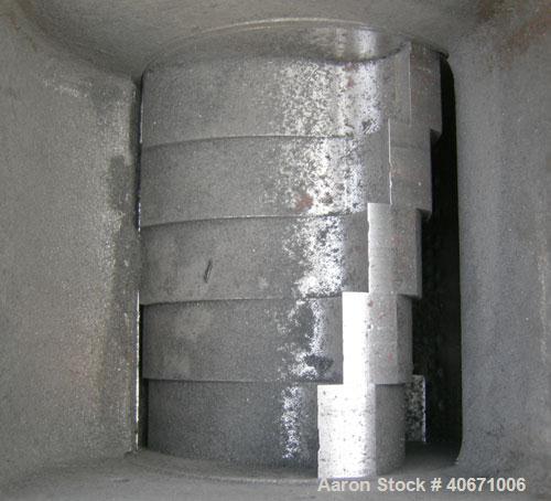 Used Conair/Wortex Granulator, model LP-330. Approximate 6" diameter x 7" long segmented helical type rotor with 3 rows of 5 blades. 7 3/4" x 7 1/4" carbon steel chamber. 24" x 24" top feed opening. ...