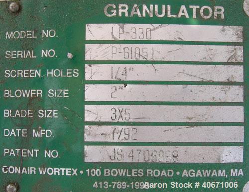 Used Conair/Wortex Granulator, model LP-330. Approximate 6" diameter x 7" long segmented helical type rotor with 3 rows of 5 blades. 7 3/4" x 7 1/4" carbon steel chamber. 24" x 24" top feed opening. ...
